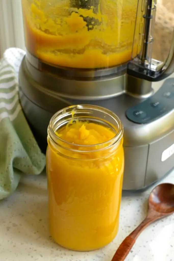 A mason jar full of pumpkin puree