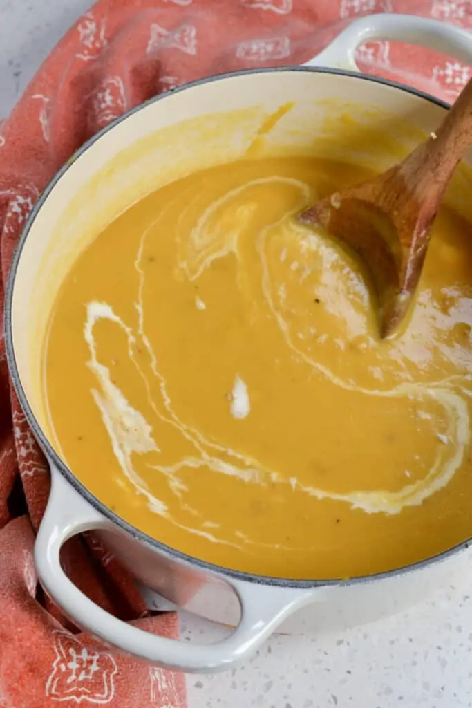 A Dutch Oven full of homemade pumpkin soup. 