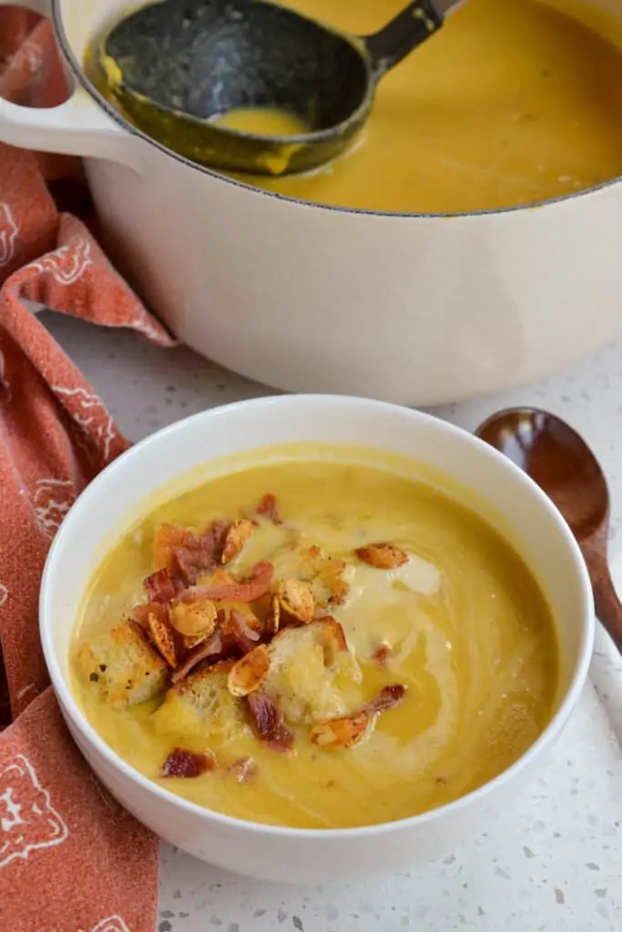 This mouthwatering good easy pumpkin soup recipe combines fresh pumpkin puree with onions, garlic, fresh ginger, paprika, chicken broth, and cream.