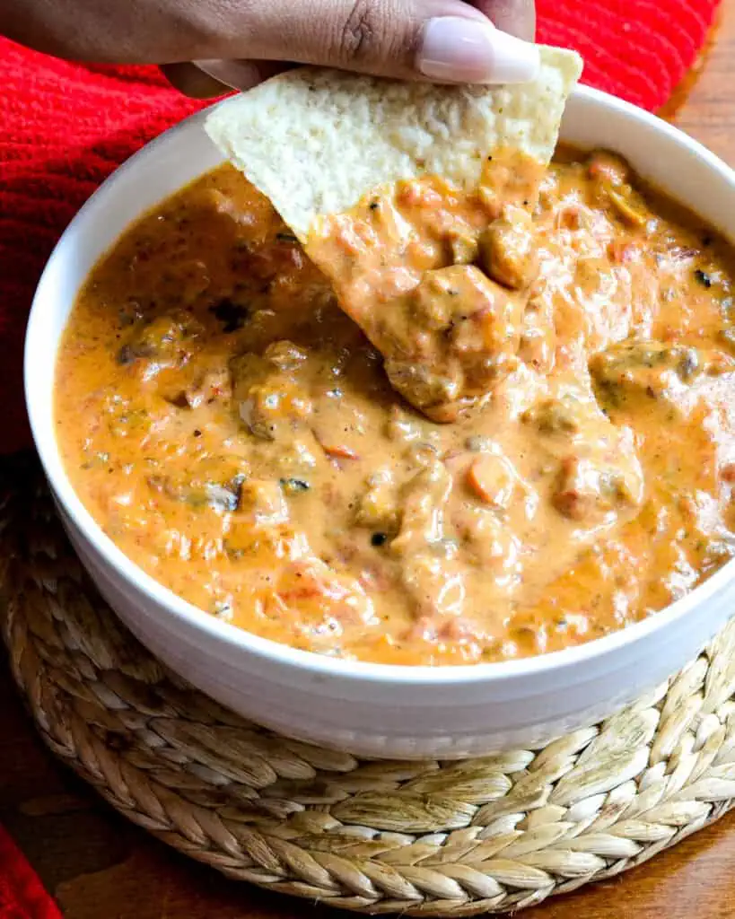 A chip full of hot Rotel Dip