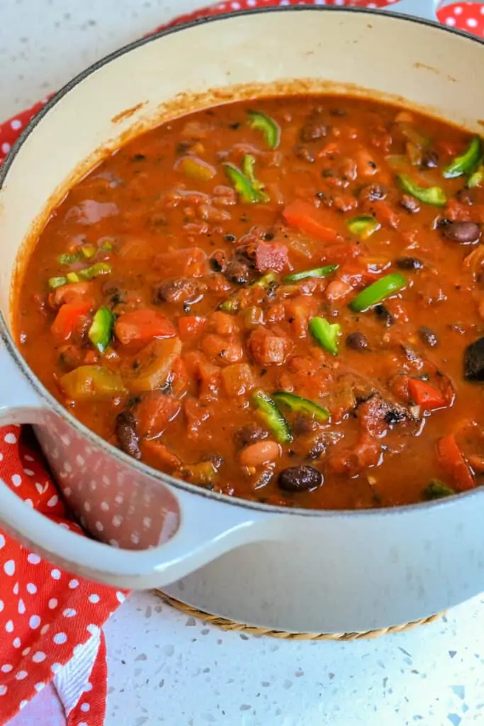 A Dutch Oven full of hot vegetarian chili. 