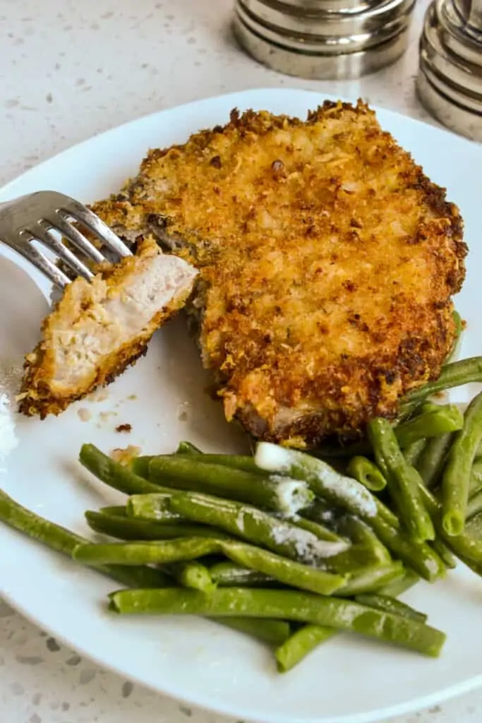 These quick and easy Air Fryer Pork Chops are breaded with panko breadcrumbs for extra crispiness on the outside yet tender and juicy on the inside.  