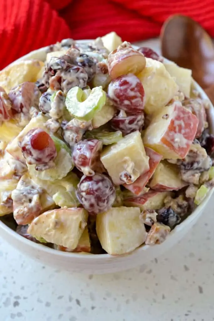 A bowl full of fresh apple salad. 