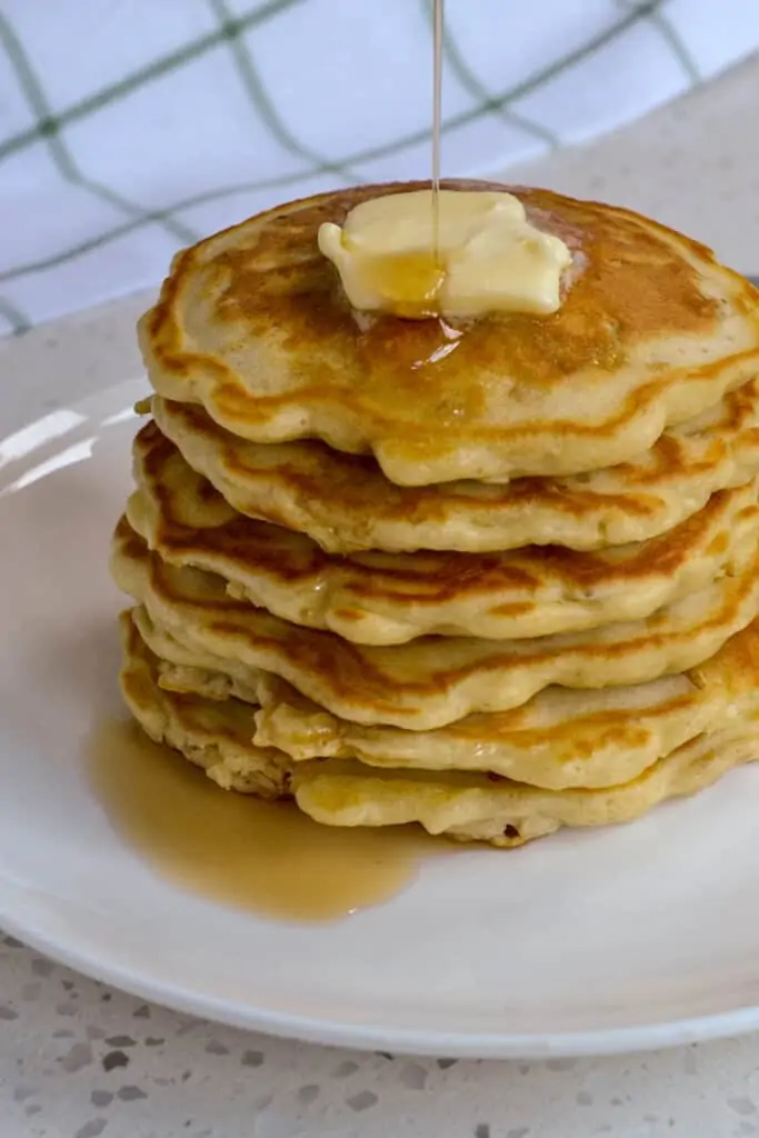 Warm syrup drizzled over hot buttermilk oatmeal pancakes. 