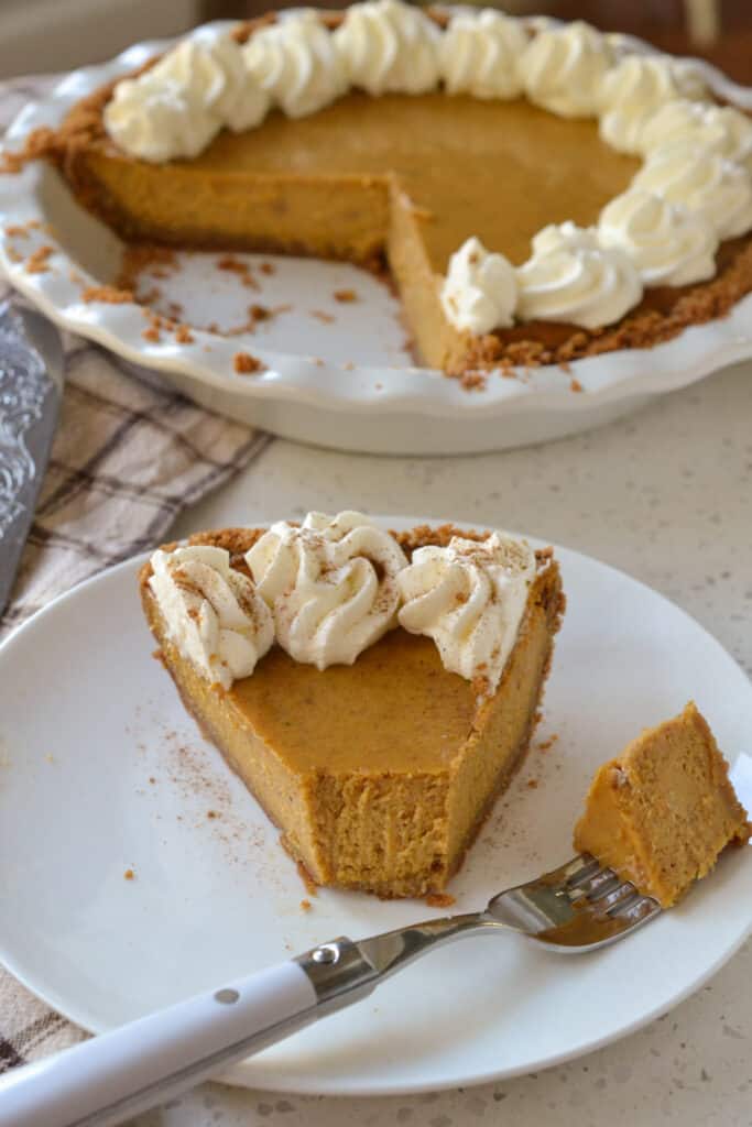 A fork full of the best pumpkin pie recipe.  