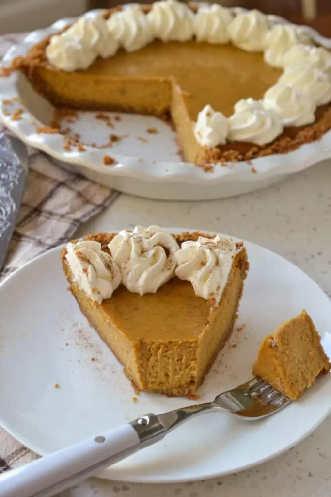 A simple yet delicious, perfectly spiced homemade pumpkin pie with the perfect balance of sweetness and an easy three-ingredient graham cracker crust.  Bake one up today and let your family savor the goodness of fresh homemade pie.