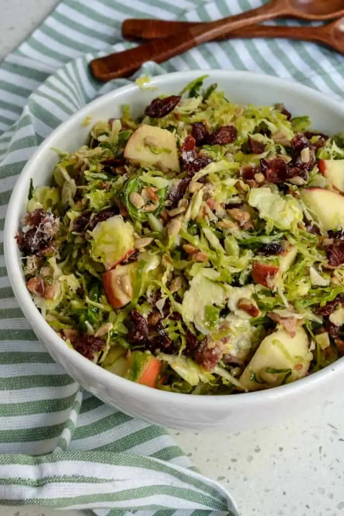 A quick and easy salad with brussels sprouts, apples, cranberries, pecans, sunflower seeds, and bacon. 