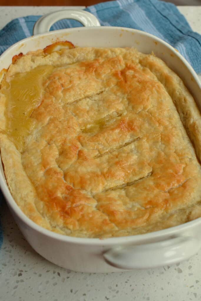 A fresh baked chicken pot pie with a homemade crust.