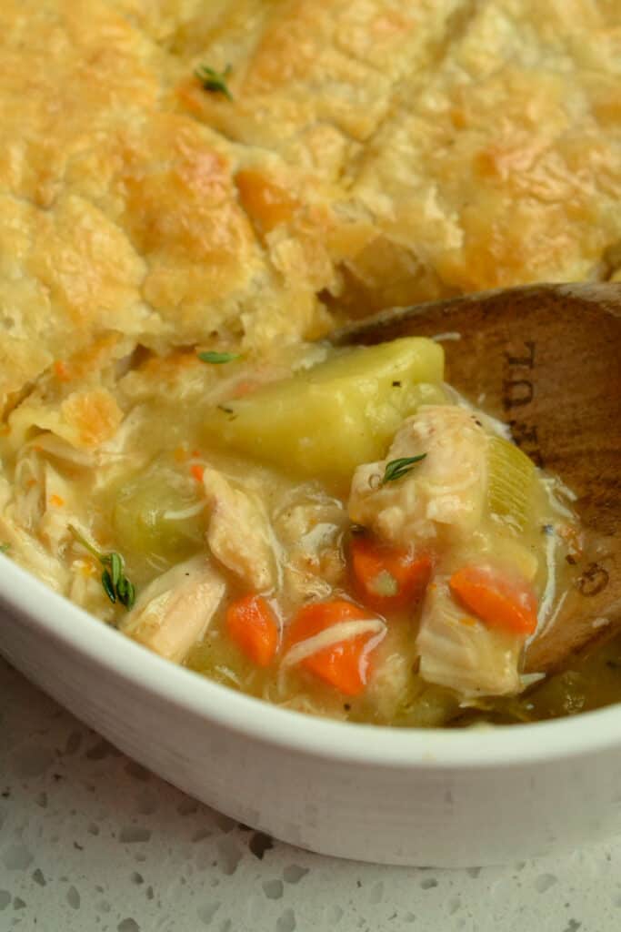 Fresh baked chicken pot pie with onions, carrots, celery, and potatoes.