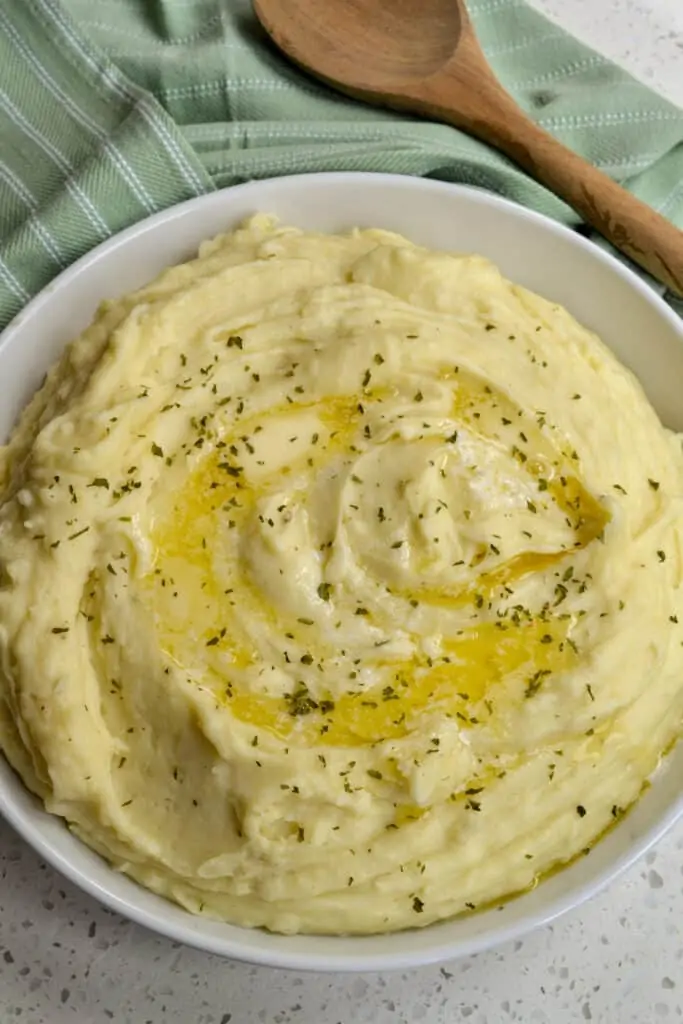 Easy and delicious Instant Pot Mashed Potatoes made with simple ingredients and ready in under 25 minutes.  