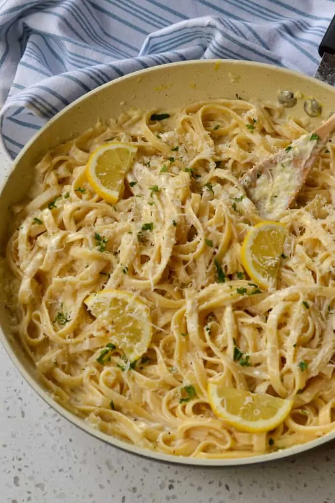 Quick and easy fettucine pasta with cream, fresh lemons, and lemon juice. 