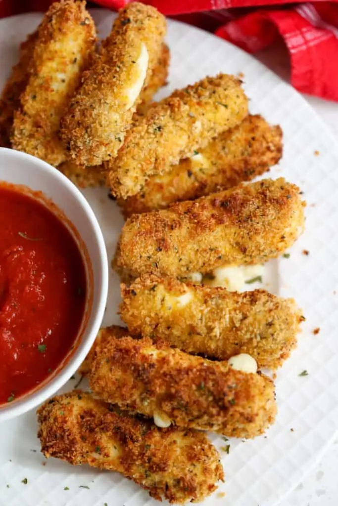 Easy Panko breaded Air Fryer Mozzarella Sticks cooked up crispy in the air fryer. Just as delicious as deep fried without the mess and added calories. 