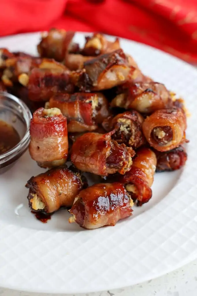 Cheese stuffed bacon wrapped dates are a popular party appetizer. 