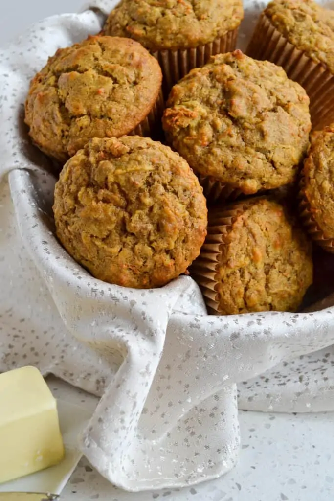 Healthy Bran muffins never tasted better! These moist little gems are plump full of flavor and texture from wheat bran, walnuts, carrots, and apples. 