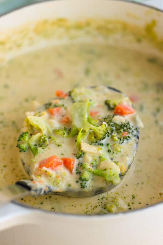 A ladle full of Broccoli Cheddar Soup