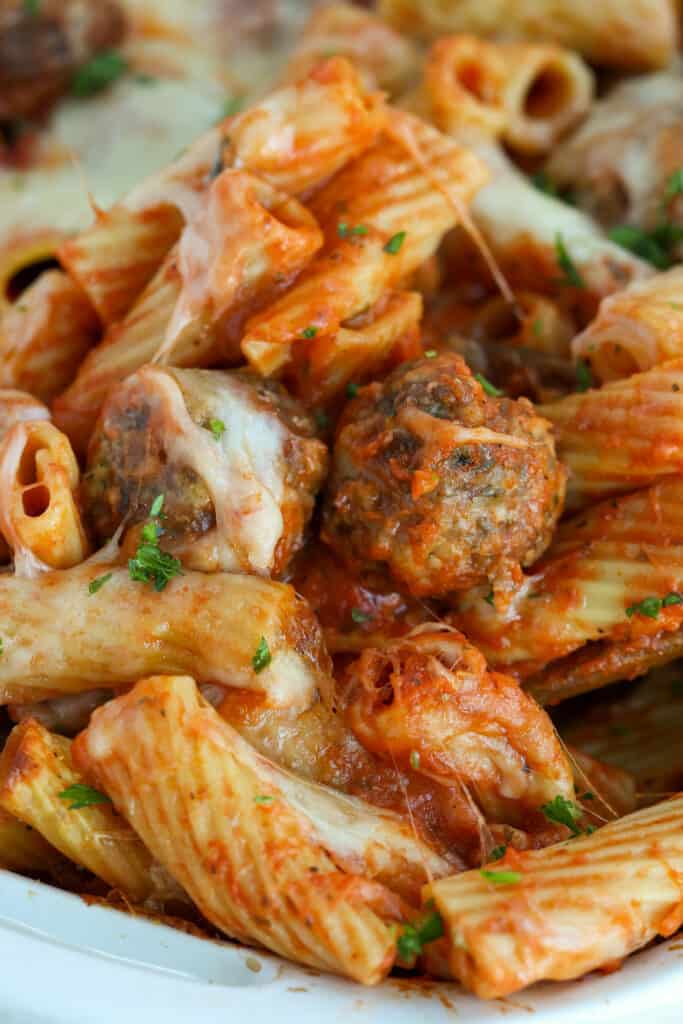 Yummy meatball casserole with homemade meatballs, rigatoni, and oodles of mozzarella cheese.