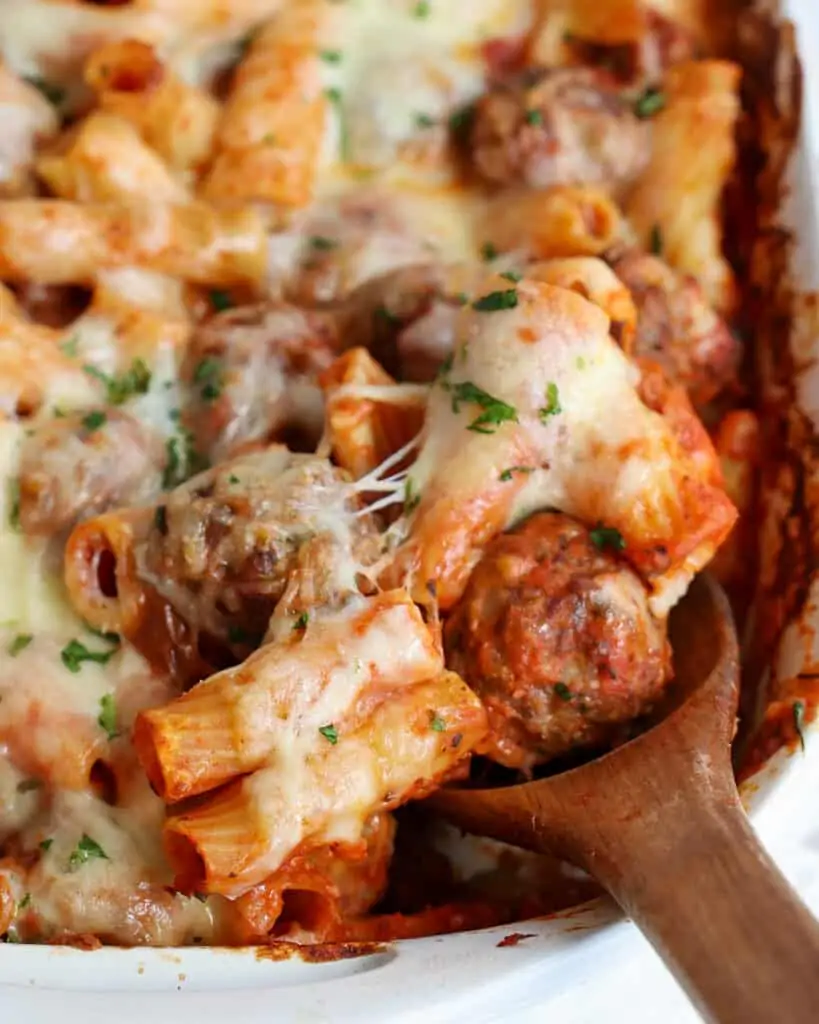 A delicious homemade meatball, marinara. pasta, and mozzarella casserole. 