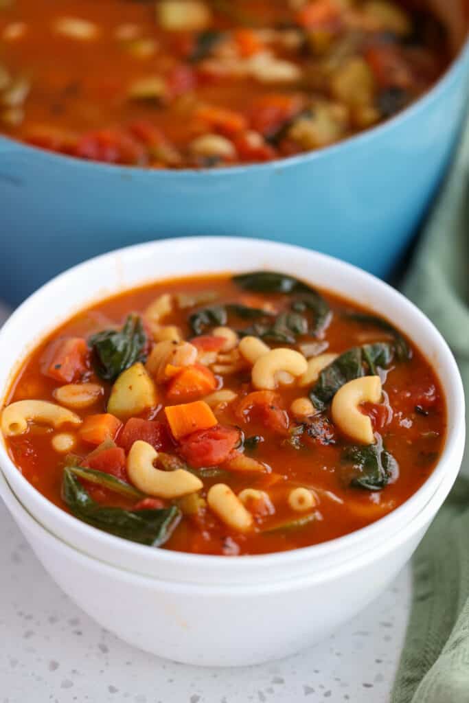 The heart of this soup is fresh seasonal vegetables along with pasta, beans, tomatoes, and Italian seasonings.  Some of the usual suspects for veggies include onions, celery, carrots, green beans, and garlic. 