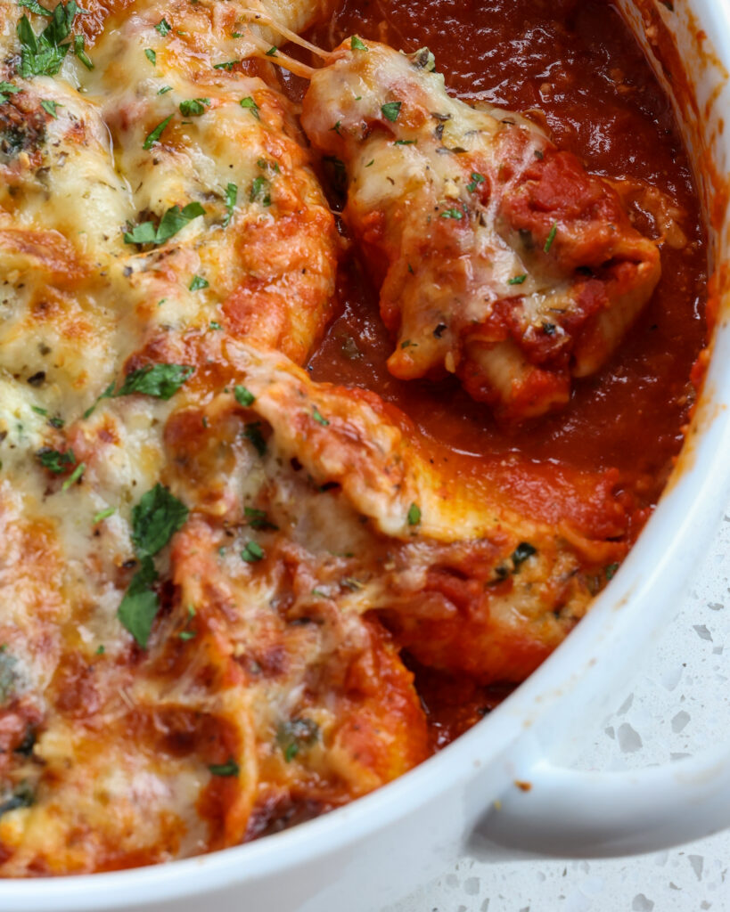 Baked shell in tomato sauce with mozzarella.  