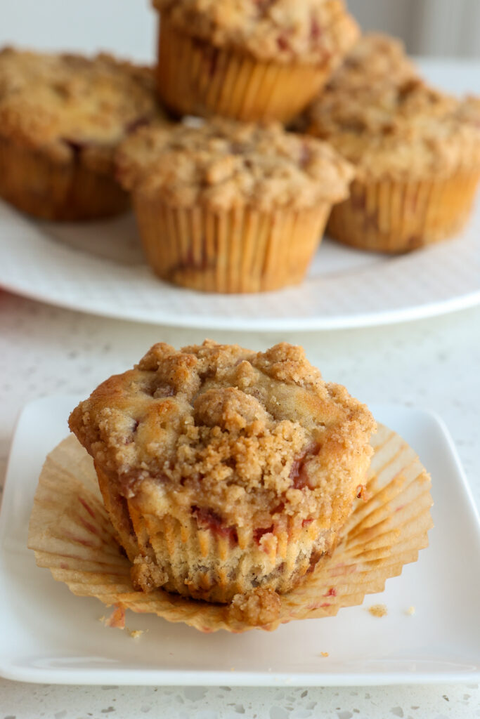 Bring spring in early with these homemade bakery-style strawberry muffins made with fresh strawberries, cinnamon, buttermilk, vanilla, and a streusel crumb topping. 