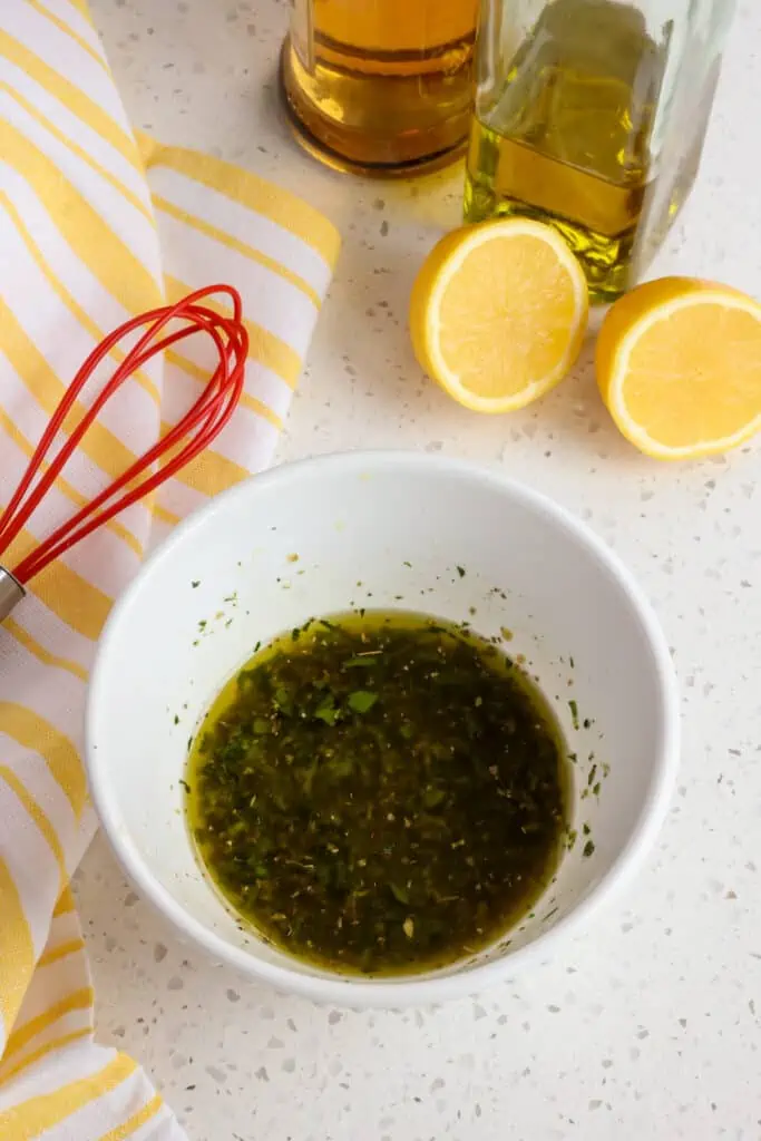 Fresh Lemon Honey Vinaigrette with fresh basil and parsley.