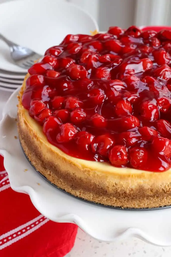 Top the cheesecake with premium cherry pie filling.  