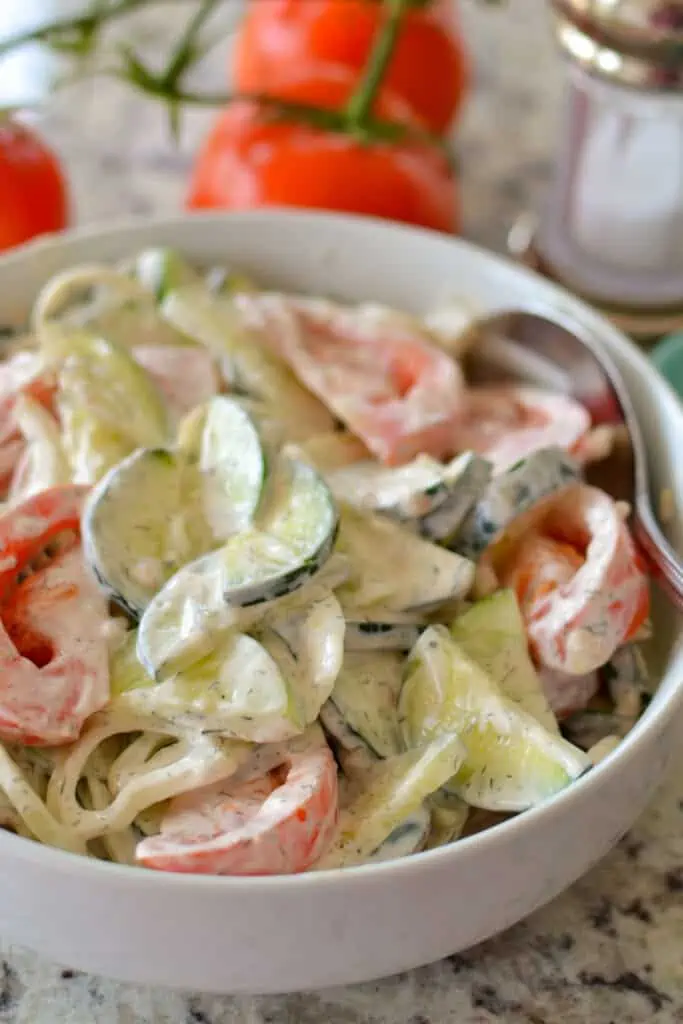 This creamy and fresh Cucumber Tomato Salad is sure to become one of your favorite summer salad recipes. 