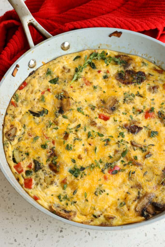 A skillet frittata with mushrooms, peppers, and zucchini. 