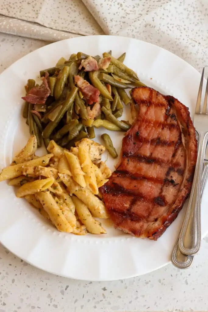 This delicious and easy grilled Ham Steak with Brown Sugar Glaze is made with five simple ingredients and is ready in less than twenty minutes.  