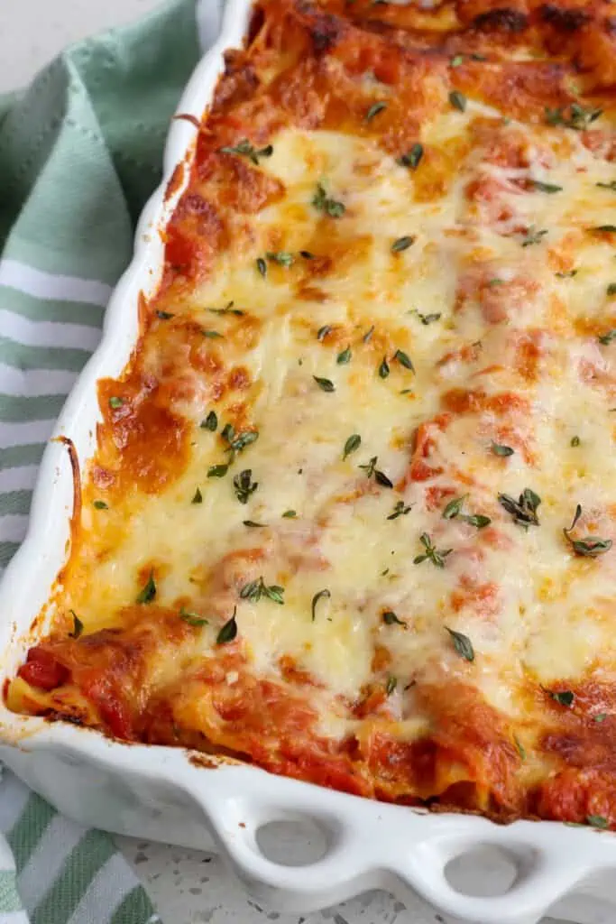 A casserole dish full of vegetable lasagna. 