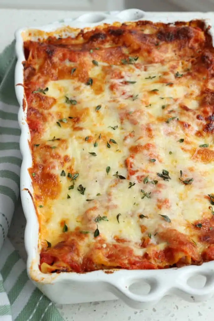 Veggie Lasagna with onions, mushrooms, zucchini, red bell peppers, and spinach. 