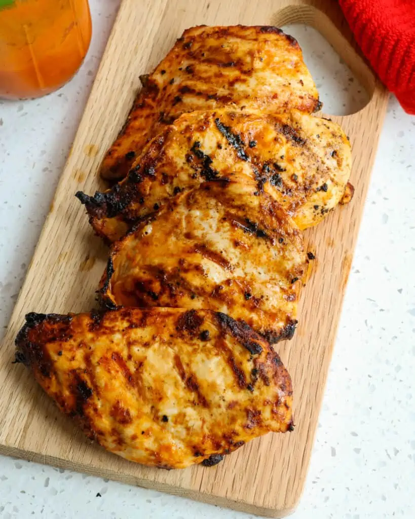 Grilled Buffalo Chicken on a cutting board. 