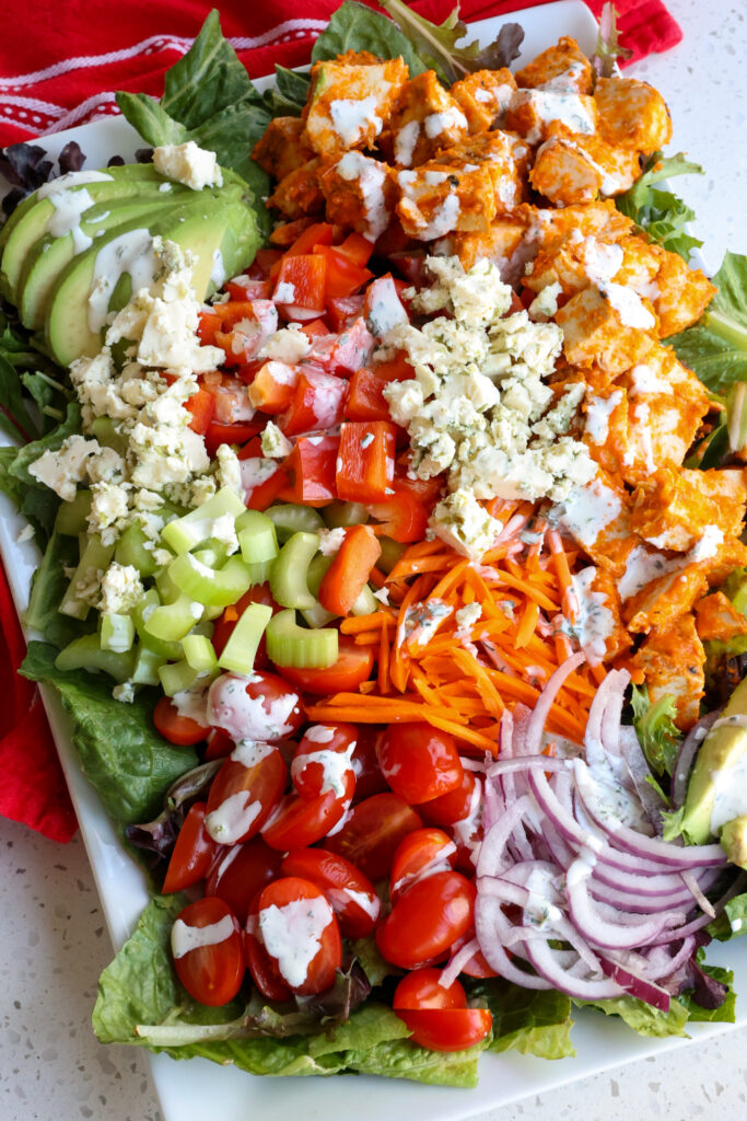 Buffalo Chicken Salad drizzled with homemade ranch dressing.  