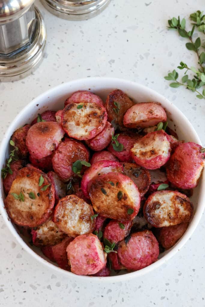 This delightfully fresh Roasted Radishes Recipe combines a handful of common pantry spices with fresh garden radishes and roasts them to perfection for a flavorful side dish.