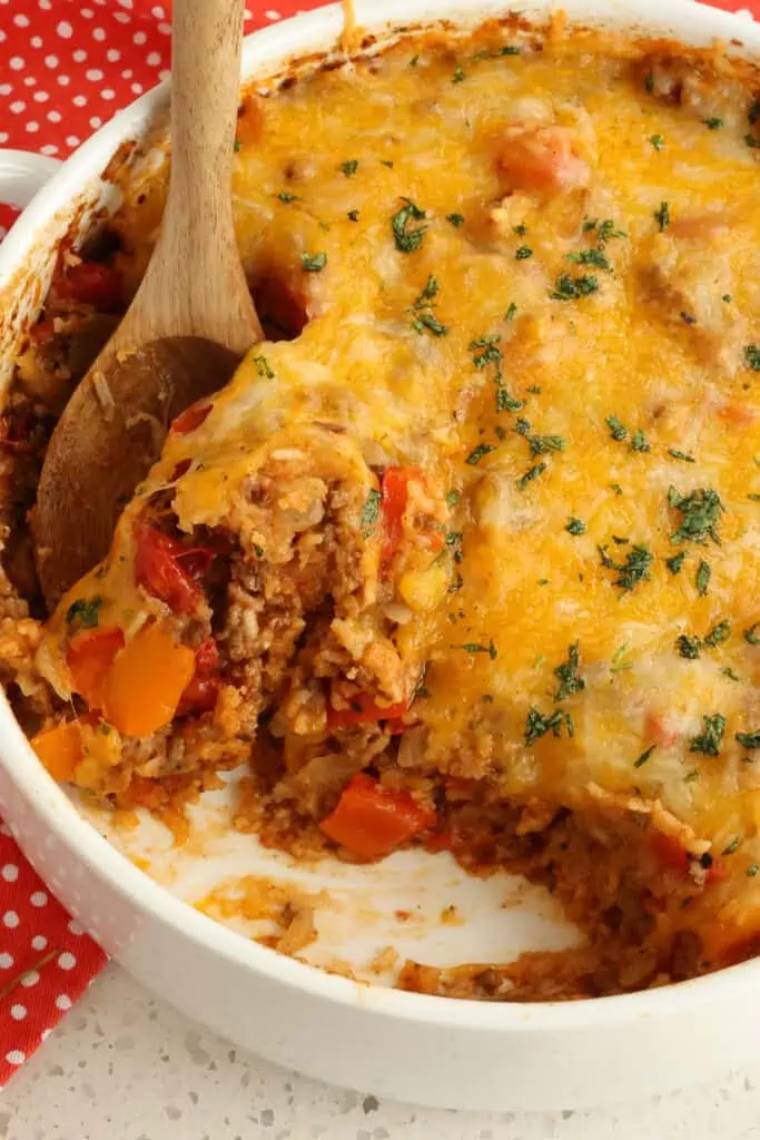 Stuffed pepper casserole with ground beef, onions, garlic, bell peppers, tomatoes. and cheese. 