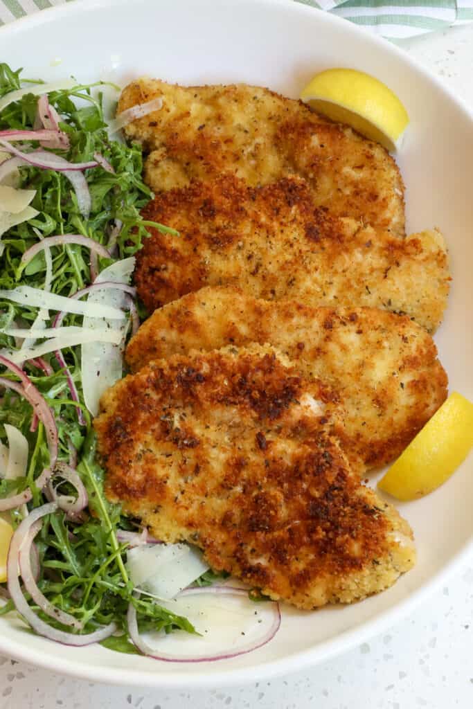 Serve Chicken Milanese with fresh lemon wedges for light spritzing. 