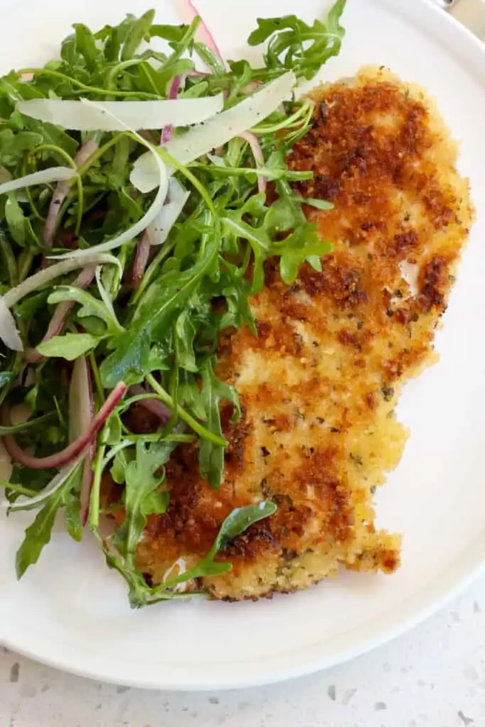 This tasty dish that originated in Milan is the perfect balance of texture and flavor with crisp golden brown chicken and peppery arugula tossed with lemon juice and Parmesan Cheese. 