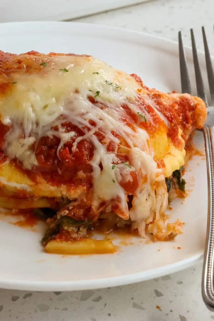 A close up slice of ravioli lasagna. 