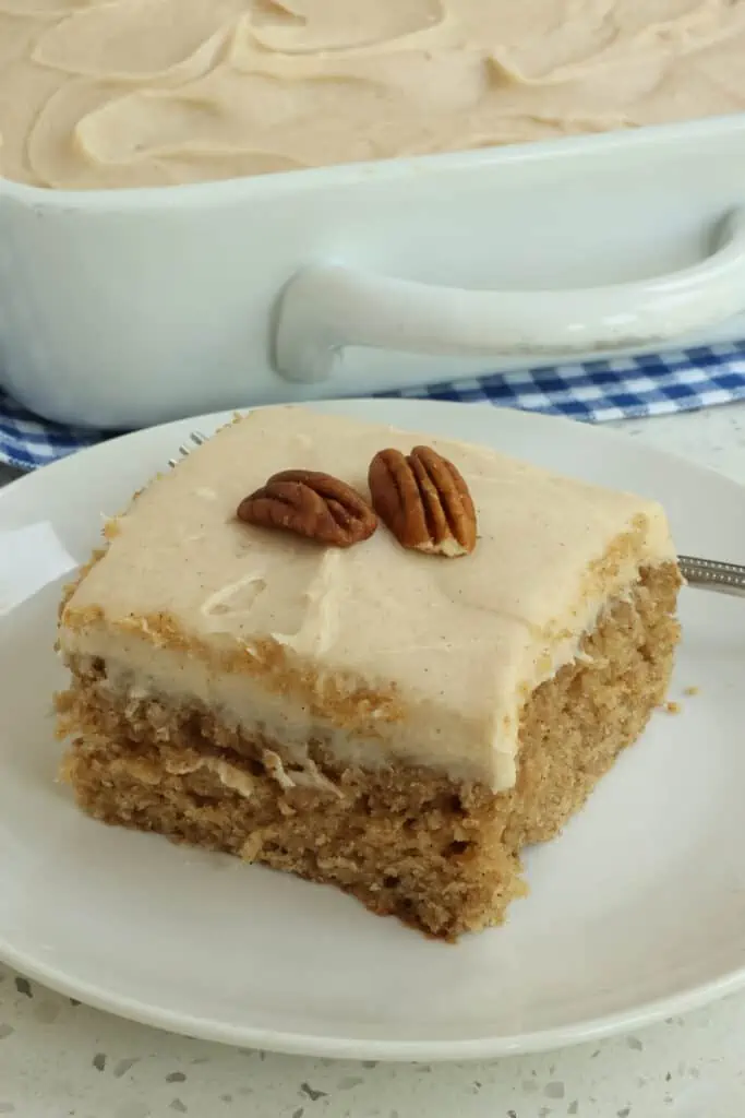 This delicious and moist Applesauce Cake is made with applesauce, ground cinnamon, ginger, nutmeg, and cloves all topped with a delicious five ingredient cinnamon cream cheese frosting.  