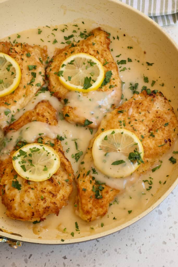 This tasty Francese Chicken dish is one of our favorites.  It is so easy to make, goes with so many side dishes, tastes scrumptious, and fills our hearty appetite with plenty of protein.  