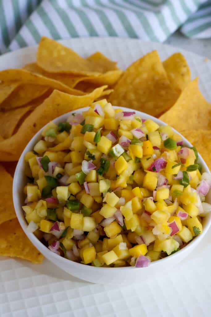 This delicious Mango Salsa is made easy with fresh mangoes, jalapeño, red onion, cilantro, fresh lime juice, and a couple of simple pantry seasonings.