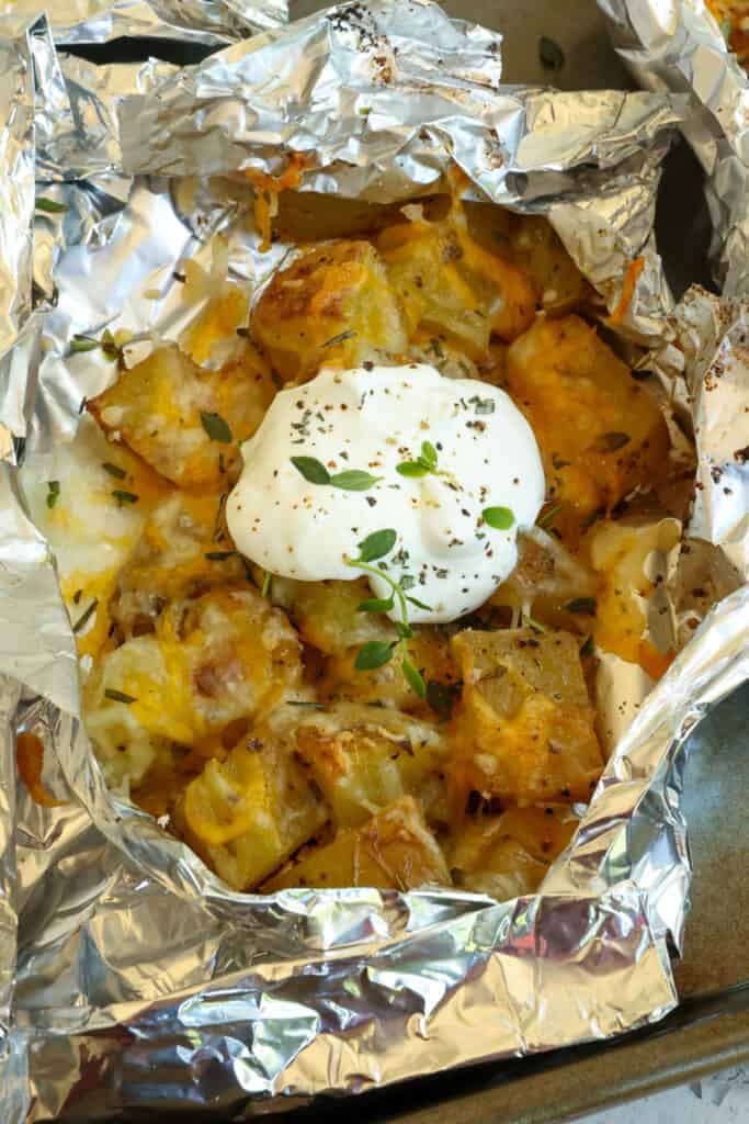 These Easy Potato Foil Packets combine potato chunks or slices with olive oil, kosher salt, black pepper, garlic powder, onion powder, and fresh herbs into handy foil packets.