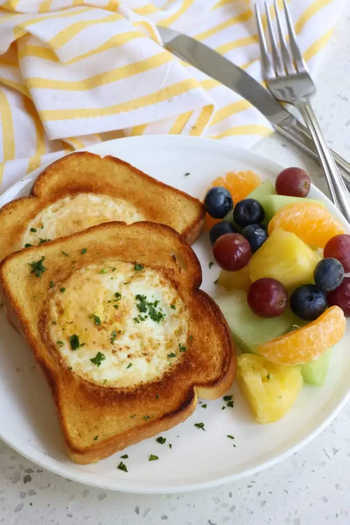 Eggs in a hole is made in less than 5 minutes and it is totally customizable to how you like your eggs cooked.