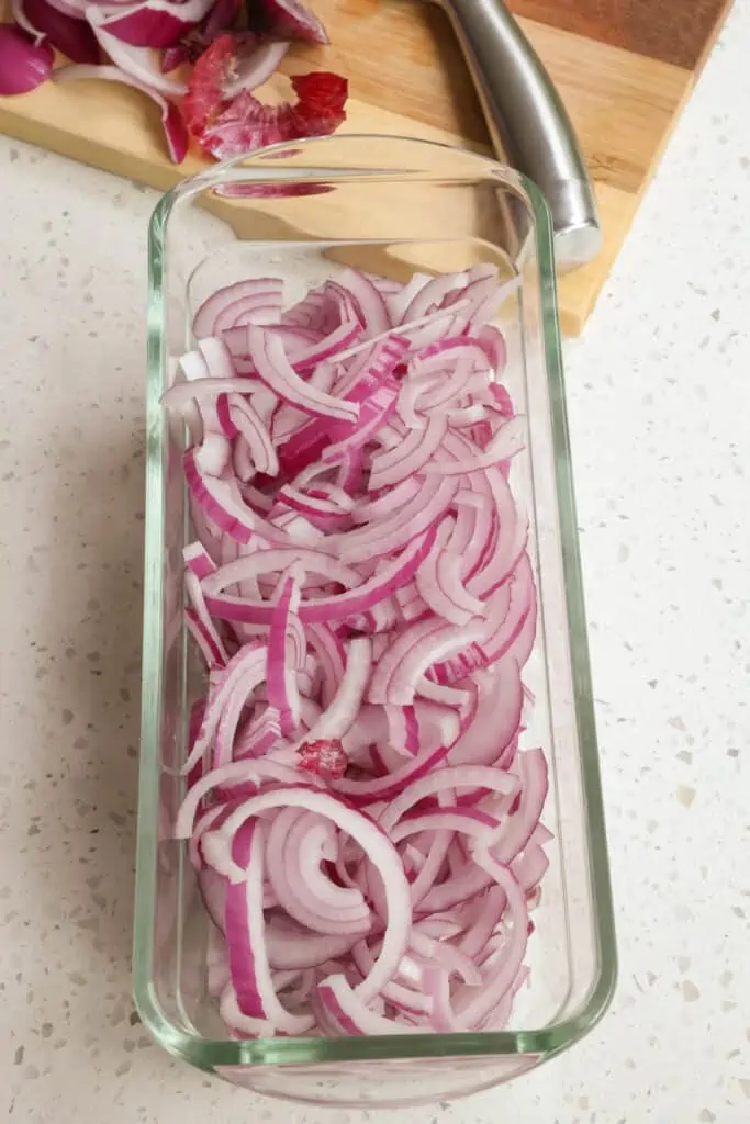 Slice the onions thin but not too thin.  I like mine with a little bit of substance for burgers, brats, and sandwiches but you can slice them thinner if you like. 