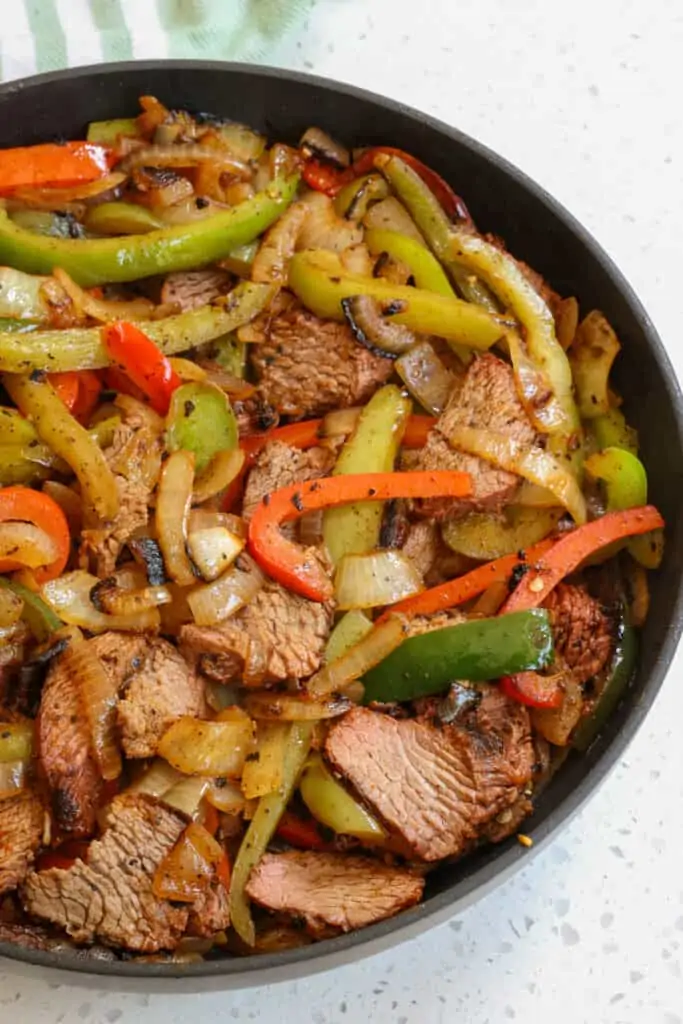 Hands on time is less than 30 minutes for a dish with authentic fajita flavor. Serve with charred flour tortillas, fresh limes, and a side of beans and rice.