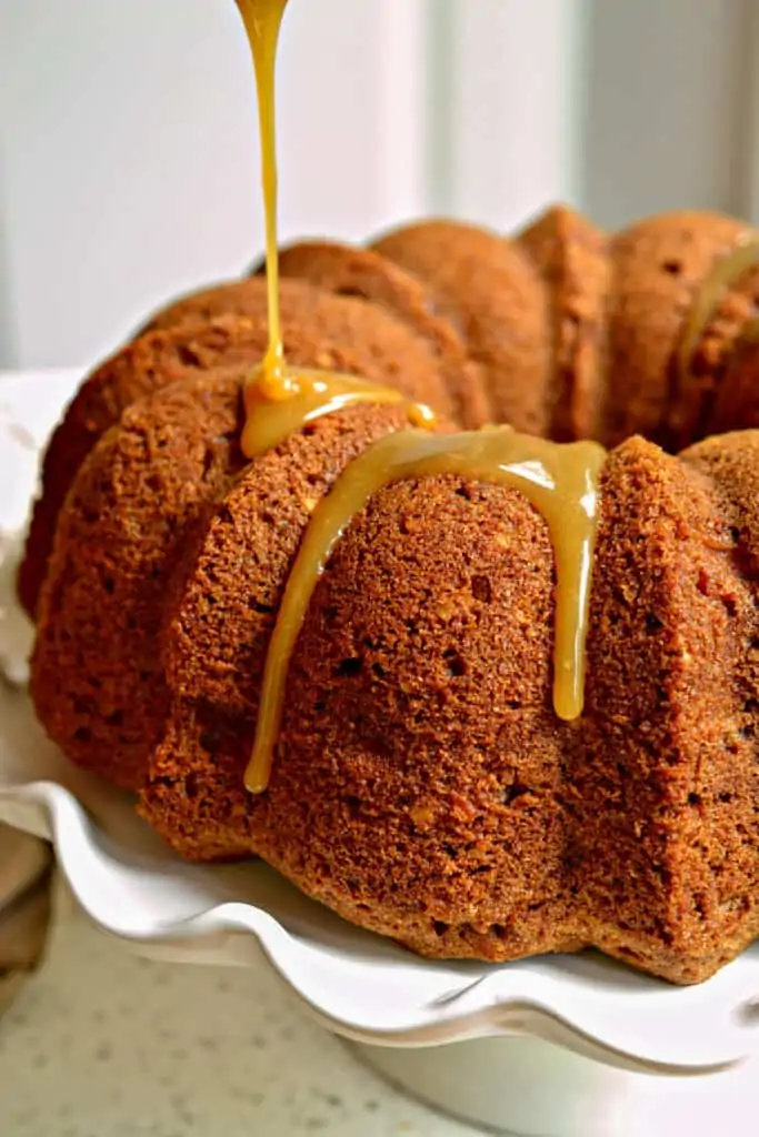 This apple cake is lightly drizzled with an easy four ingredient caramel sauce.