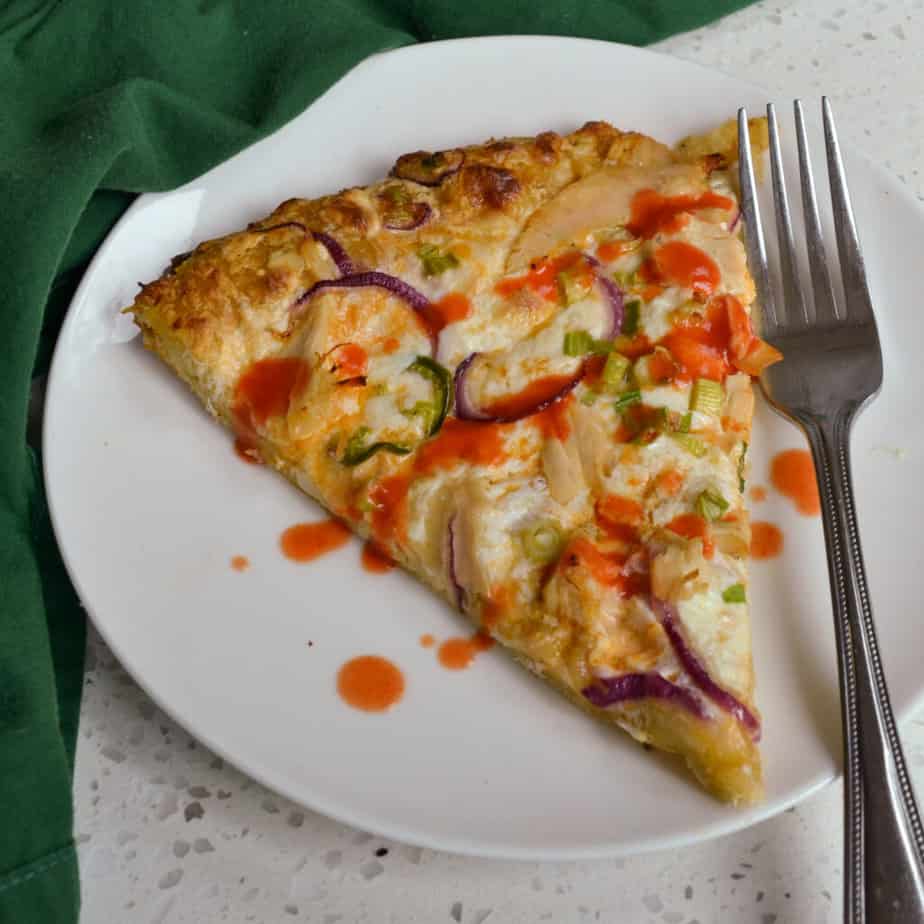 Top this Buffalo Chicken Pizza with your choice of ingredients.  Try finely chopped red pepper, green pepper, red onion or scallions.  Or try banana peppers, serrano peppers or jalapeno pepper rings.