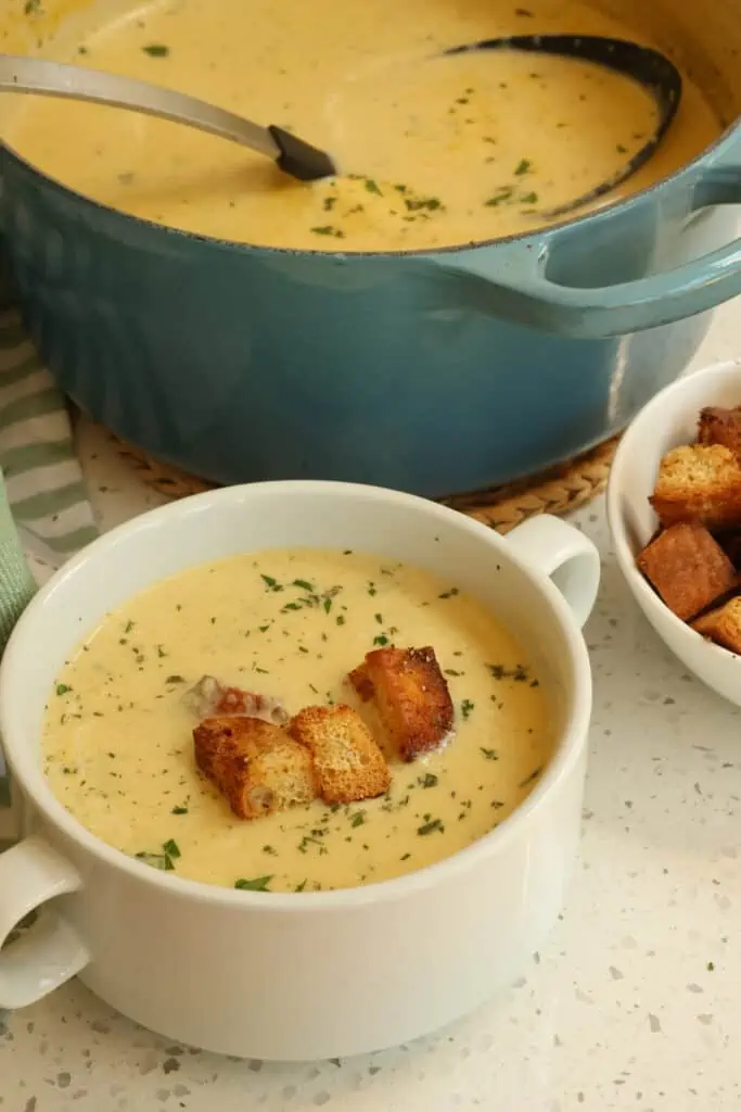 This quick and easy Cream of Celery Soup combines onions, celery, and garlic in a creamy base seasoned with plenty of fresh herbs like parsley, thyme, and rosemary