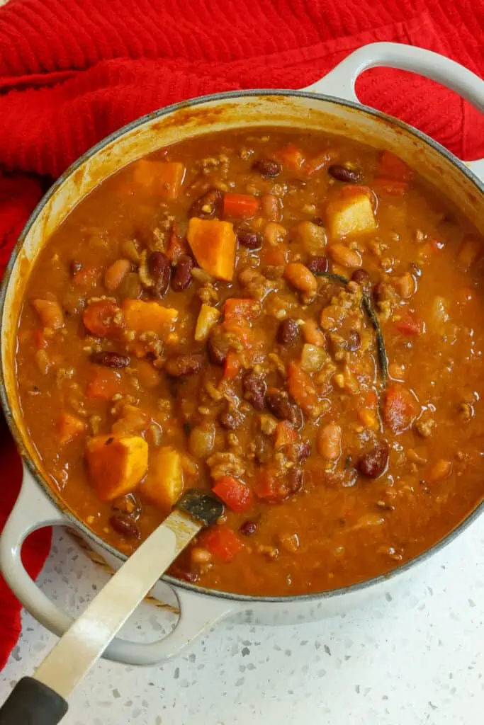 Simmer until the sweet potatoes are tender and the chili has slightly thickened. 