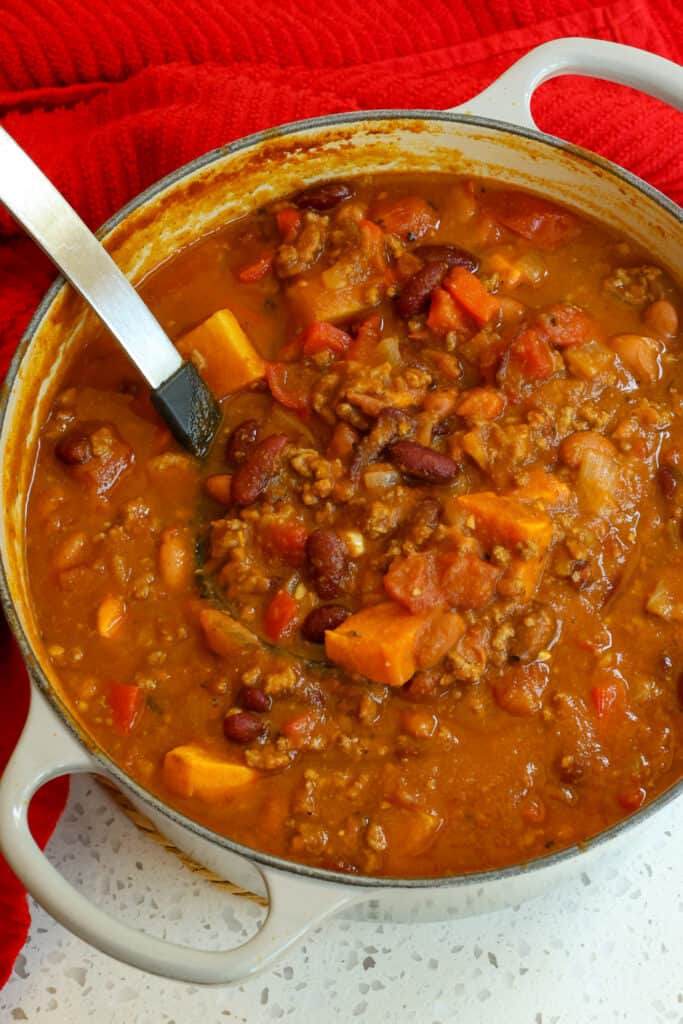 This pumpkin chili is one of my favorite chili recipes and a must try for the fall and winter season.  It is a nice change from the traditional red chili and it comes together quickly and easily.  